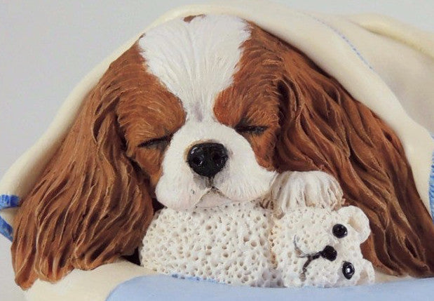 Sculpture Of A Cavalier King Charles Spaniel Wrapped in a Blanket